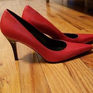 Red and black pumps